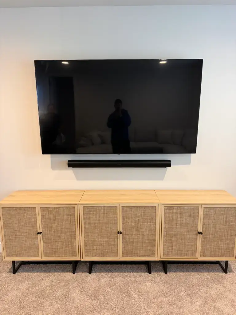 Wall mounted TV and soundbar installation with in wall wire concealment completed by ZehmTV for a customer in Puyallup Washington
