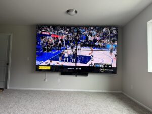 2x2 video wall installation with four 65 inch TVs mounted by ZehmTV Mounting Services in Lacey, WA