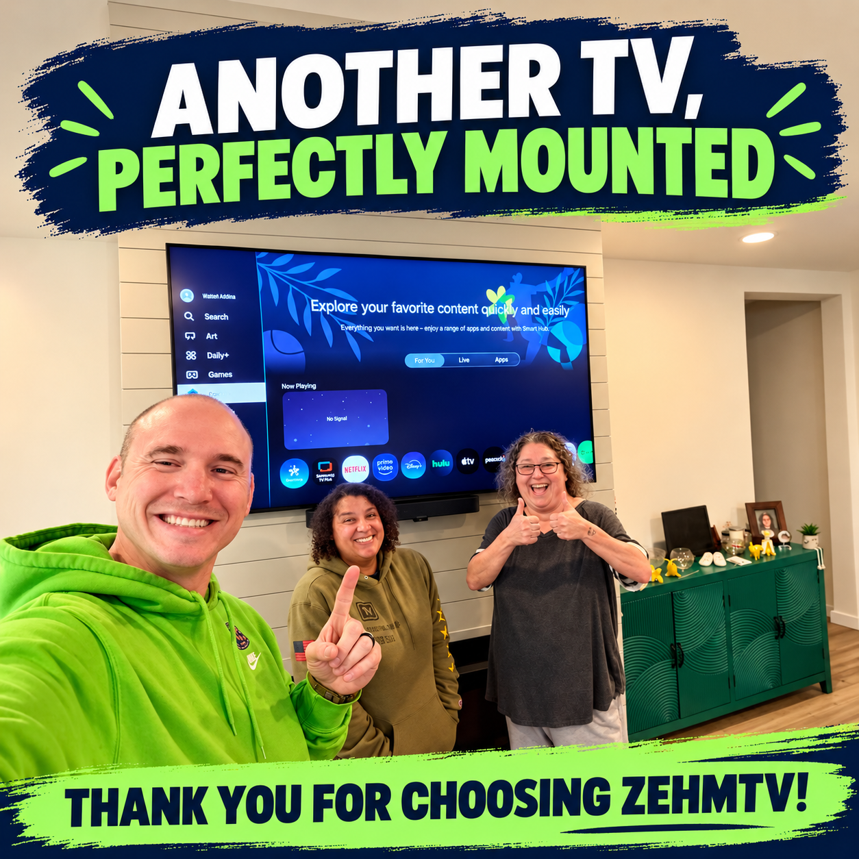 Alex and Jenae of ZehmTV smiling with a customer giving two thumbs up beside her newly mounted TV and soundbar